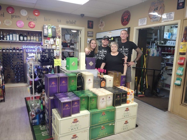 Store pic staff Sam's Package Store team inside the store